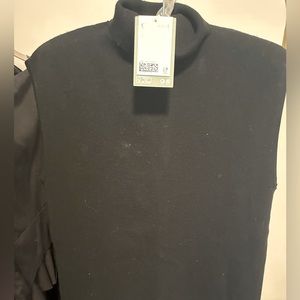 Long black turtleneck sleeveless dress